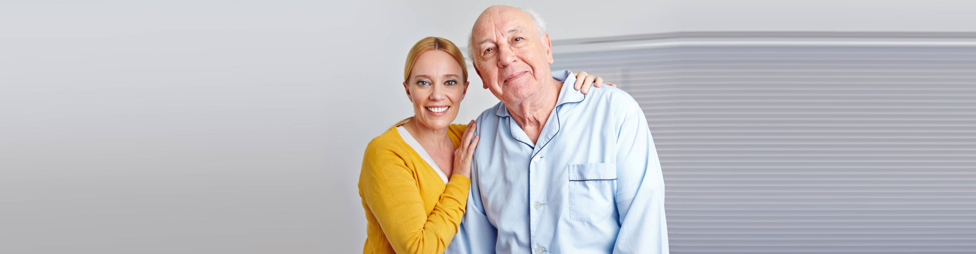 woman and old man smilling